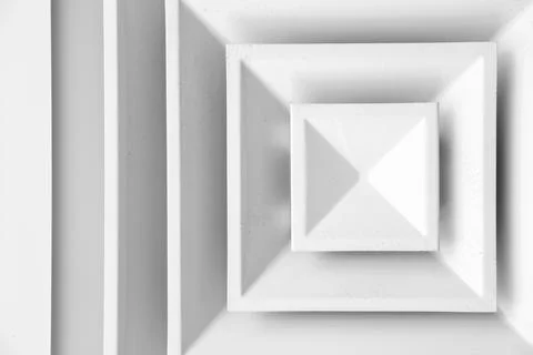 White ceiling ventilation grille with dust on diffusors Stock Photos