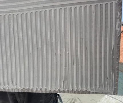 White Cement Adhesive Applied to Back of Porcelain Tile 写真素材