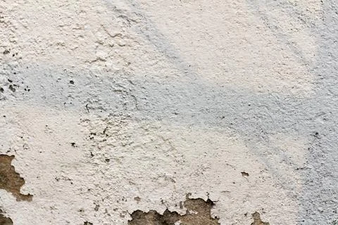 The white cement wall surface is peeling, dirty, old Stock Photos