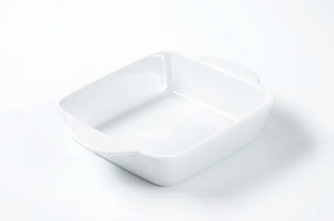 White ceramic baking dish with handles Stock Photos