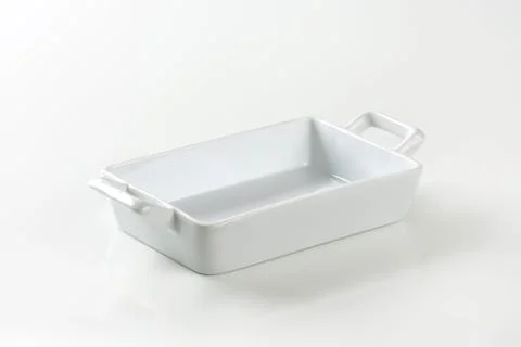 White ceramic baking dish with handles Stock Photos