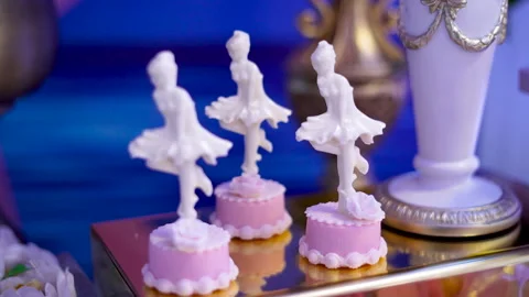 White ceramic ballerinas decorating table Stock Footage 266073055