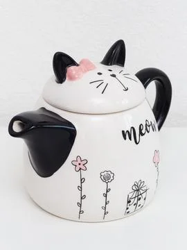 White ceramic cat teapot angled view variant Stock Photos