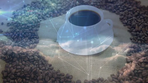 White ceramic coffee cup sitting on burlap ringed by coffee beans, showing Video stock 307445251