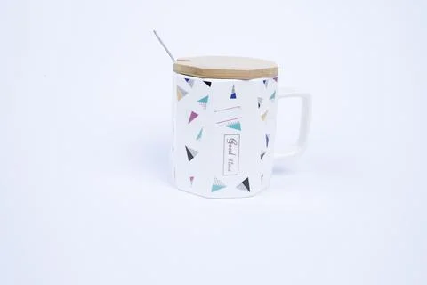 White ceramic coffee mug. Isolated on a white. Stock Photos