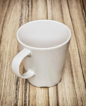 White ceramic cup with handle, kitchenware Stock Photos