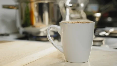 White ceramic cup with hot coffee, close-up Stock Footage 126374312