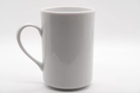 White ceramic cup isolated on a white background Stock Photos