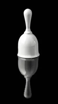 White ceramic hand bell Stock Photos