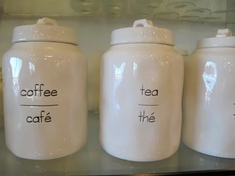 White ceramic jars with tops Foto stock
