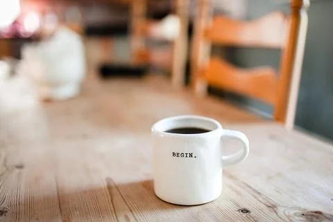 White Ceramic Mug on Table Stock Photos