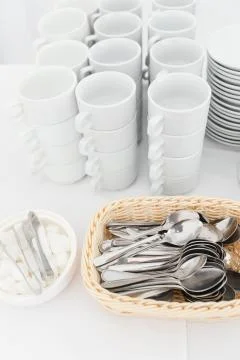 White ceramic mugs. Group of empty coffee cups. White cup for service tea or Stock Photos