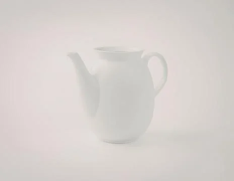 White ceramic pitcher with handle and spout Photos