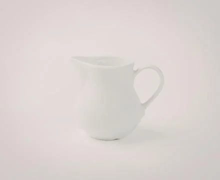 White ceramic pitcher with handle Photos