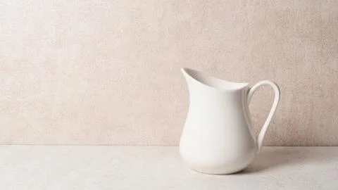 White Ceramic Pitcher on Table Stock Photos