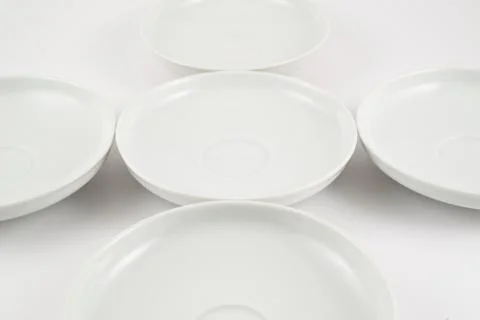 White ceramic plate composition background Stock Photos