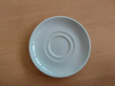 White ceramic plate on the table Stock Photos
