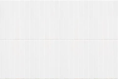 White ceramic strips with vertical structure Stock Photos