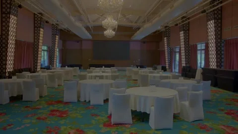 White chair and table ready for corporate events in banquet hall india Stock Footage 318643797