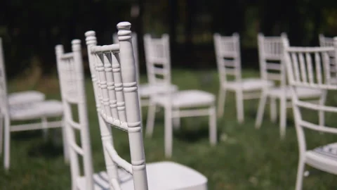 White chairs in rows for the wedding ceremony. Stock Footage 116021643