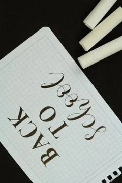 White chalk on a black background. Stock Photos