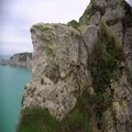 White chalk cliff covered with grass, view on rocks and sea from mountain top 4k or 4k+ Resolution
