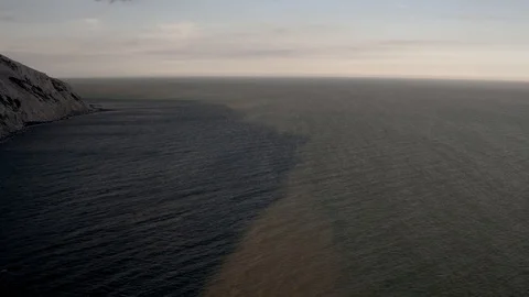 White chalk cliffs and Beachy Head Lighthouse. Eastbourne, East Sussex, England Stock Footage 88542707