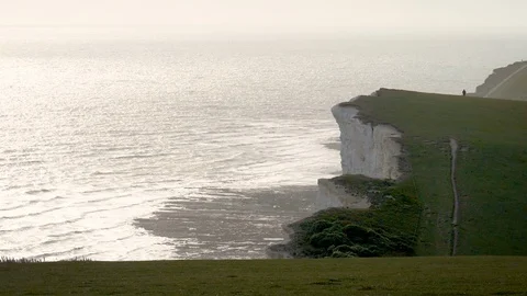 White chalk cliffs and the English Channel, Sussex, England Stock Footage 114990241
