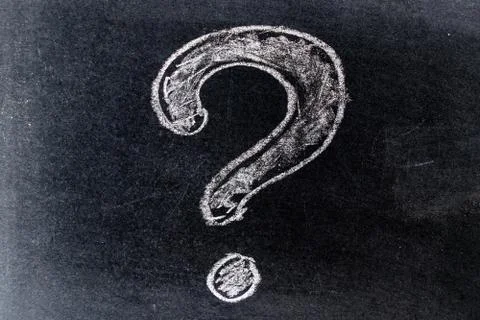 White chalk drawing in questionmark shape on black board background Stock Photos