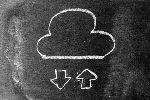White chalk hand drawing in cloud with up and down arrow icon shape on blackb Stock Photos