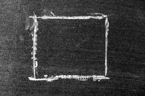 White chalk hand drawing in square or banner shape on black board background Stock Photos