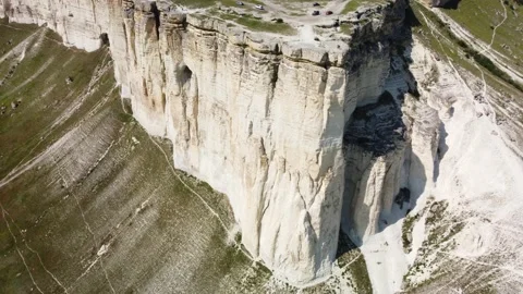 White chalk limestone rock against a blue sky aerial view Stock Footage 171426049