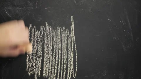 White Chalk Quickly Drawing Lines on Black Blackboard Surface with Sound for Stock Footage 321530319