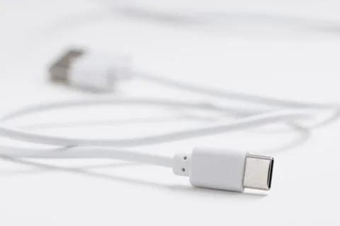 White charging and data sync USB-C to USB cable Stock Photos