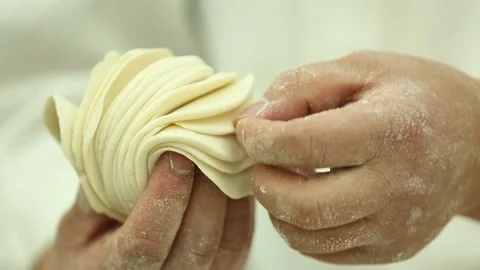 White chef rolls dumpling skin (3) Stock Footage 202153427