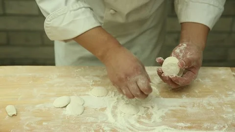 White chef rolls dumpling skin (5) Stock Footage 202153453