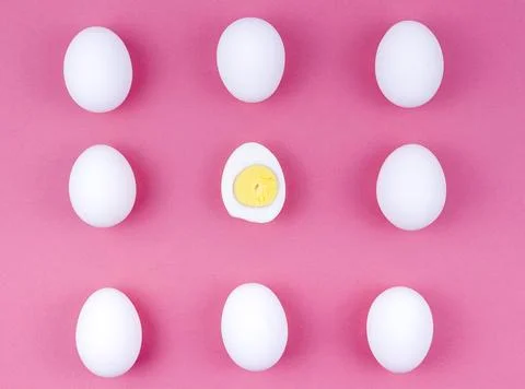 White chicken eggs with boiled egg table Stock Photos