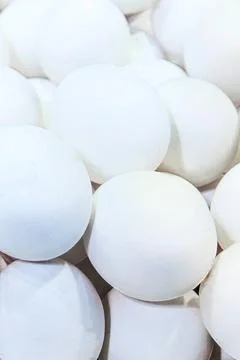 White chicken eggs close-up. Easter egg background. Beautiful white eggs Stock Photos