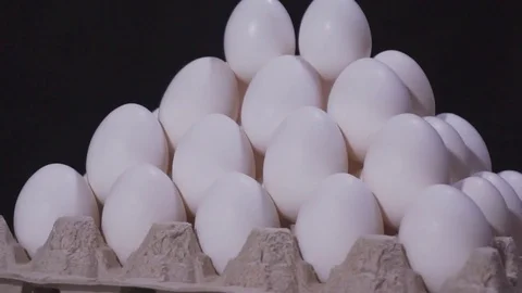 White Chicken Eggs. Eggs In Rotation Video stock 78990755