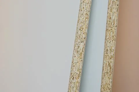 White chipboard section close up Stock Photos