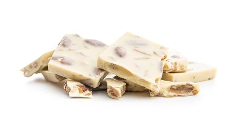 White chocolate bars with almonds isolated on white background. Stock Photos