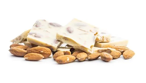 White chocolate bars with almonds isolated on white background. Stock Photos