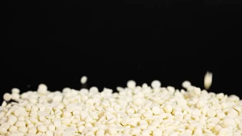 White Chocolate Chips Falling Stock Footage 324837411