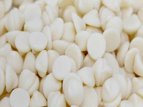 White Chocolate Chips, Rotating Macro Shot Stock Footage 74943728