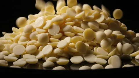 White Chocolate Drops Falling 4K Slow Motion Stock Footage 331297971