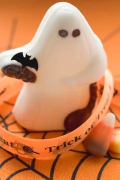 White chocolate ghost and candy corn for Halloween Stock Photos