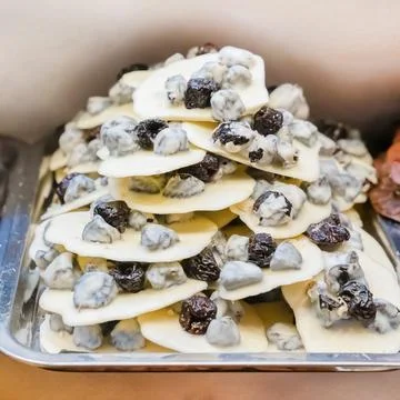 White chocolate with prunes a stack of sweets close-up Stock Photos