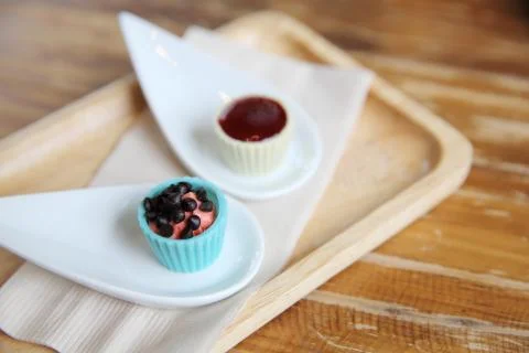 White chocolate with strawberry sauce Stock Photos