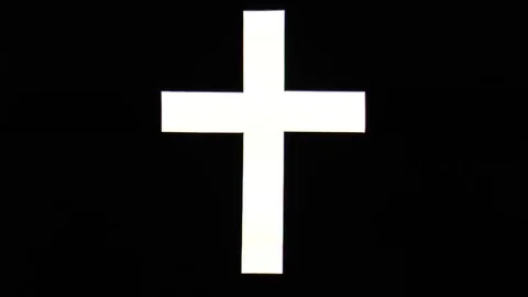 White christian cross on black background Stock Footage 80718114