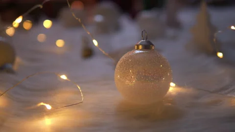 White christmas ball with light on wool for celebration christmas and new year Stock Footage 318517413
